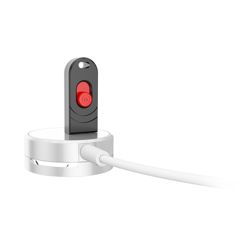 J-Plug Alarm Key being used on an alarm puck.
