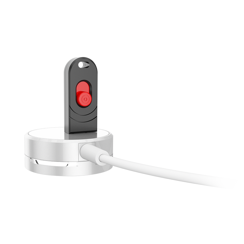 J-Plug Alarm Key being used on an alarm puck. 
